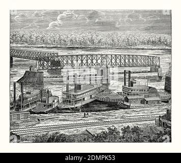 Ein alter Stich der ersten Keokuk-Brücke um 1880. Es ist aus einem viktorianischen Maschinenbaubuch der 1880er Jahre. Die Keokuk Bridge war eine eingleisige Eisenbahnbrücke über den Mississippi River in den Vereinigten Staaten zwischen Keokuk, Iowa, und Hamilton, Illinois, direkt unterhalb von Mississippi Lock und Dam Nummer 19. Sie wurde 1869–1871 erbaut und enthielt einen Schaukelabschnitt, um Schiffen die Durchfahrt zu ermöglichen. Hier ist die Brücke offen für Schifffahrt und Schaufelraddampfer an einem Kai. Eine spätere Doppelstockbrücke wurde 1915–1916 auf denselben Pfeilern errichtet. Stockfoto