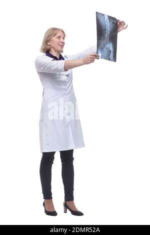 Portrait of a female doctor looking at a X-ray Stock Photo