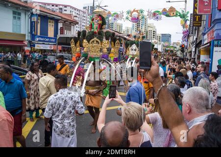 Singapore: penitent attending the Thaipusam Cavadee (or Thaipoosam Festival) in Serangoon Street, district of Little India Stock Photo