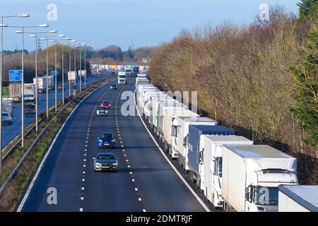 Westerhanger, Kent, UK. 17th Dec, 2020. Delays on the M20 with miles of lorry queues parked on the hard shoulder from exit 11 and further into Dover as traffic builds up due to the Dover TAP (Traffic Access Protocol). There are also delays of up to two and a half hours on ferries between Dover and Calais due to congestion. Photo Credit: Paul Lawrenson-PAL Media/Alamy Live News Stock Photo