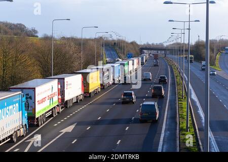 Westerhanger, Kent, UK. 17th Dec, 2020. Delays on the M20 with miles of lorry queues parked on the hard shoulder from exit 11 and further into Dover as traffic builds up due to the Dover TAP (Traffic Access Protocol). There are also delays of up to two and a half hours on ferries between Dover and Calais due to congestion. Photo Credit: Paul Lawrenson-PAL Media/Alamy Live News Stock Photo