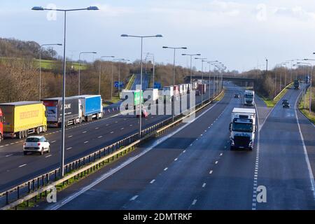 Westerhanger, Kent, UK. 17th Dec, 2020. Delays on the M20 with miles of lorry queues parked on the hard shoulder from exit 11 and further into Dover as traffic builds up due to the Dover TAP (Traffic Access Protocol). There are also delays of up to two and a half hours on ferries between Dover and Calais due to congestion. Photo Credit: Paul Lawrenson-PAL Media/Alamy Live News Stock Photo