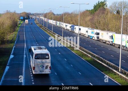 Westerhanger, Kent, UK. 17th Dec, 2020. Delays on the M20 with miles of lorry queues parked on the hard shoulder from exit 11 and further into Dover as traffic builds up due to the Dover TAP (Traffic Access Protocol). There are also delays of up to two and a half hours on ferries between Dover and Calais due to congestion. Photo Credit: Paul Lawrenson-PAL Media/Alamy Live News Stock Photo