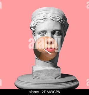 Collage with plaster head model, statue and female portrait isolated on pink background. Negative space to insert your text. Modern design. Contemporary colorful and conceptual bright art collage. Stockfoto