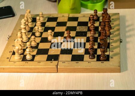 Chess board with figures on it close-up, the beginning of the game. Photo taken in Chelyabinsk, Russia. Stock Photo