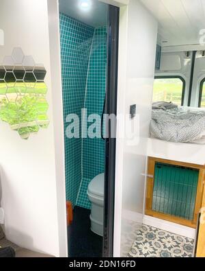 The van even has a built in shower and washroom. EAST YORKSHIRE, UK: THIS COUPLE have spent £23K transforming a VAN into their own portable HOTEL - bu Stockfoto
