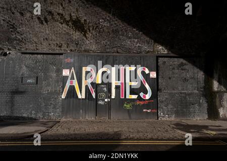 Door to the Arches project space in the old industrial area and railway arches of Digbeth on 14th December 2020 in Birmingham, United Kingdom. Following the destruction of the Inner Ring Road, Digbeth is now considered a district within Birmingham City Centre, and is the epicentre for arts and graffiti artworks as well as its status as a once-gritty bohemian district known for street art and a young and hip people attending events and creative workshops at the Custard Factory and grungy clubs in former warehouses. As part of the Big City Plan, Digbeth is undergoing a large redevelopment scheme Stock Photo