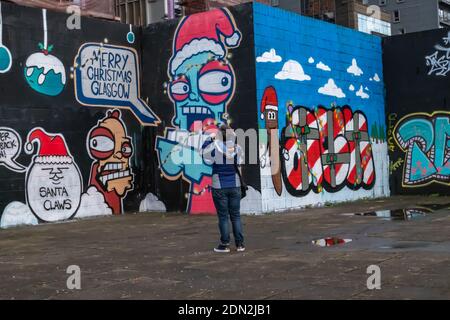 Glasgow, Scotland, UK. 17th December, 2020. New festive themed graffiti on Clydeside. Credit: Skully/Alamy Live News Stock Photo