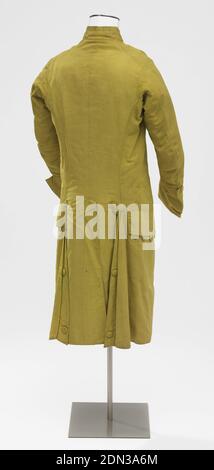 Man's suit coat, Medium: silk, linen, Man's suit coat in yellow-green ribbed silk lined with undyed linen. Self-covered buttons down the front, along the pocket flaps, around deep cuffs, and at top and sides of side vents. Coat has a small standup collar, no lapels, and three brass hooks and eyes for closing the front which slopes towards the sides of the body. Hangs to the knees., France, 1750–70, costume & accessories, Man's suit coat Stock Photo