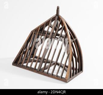 Roof model, Constructed and stained wood, Model of a roof frame as a conglomeration of frame types: front as a flat, slanted 'shed' roof; right side, a roof with a convex curve to create a dome; left side with angled 'gambrel' roof line; back left open as if to be mounted on a building. Inside elements arranged as beams and joints of the supporting structure., France, ca. 1880, models and prototypes, Decorative Arts, Roof model Stock Photo