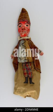 Punch, Painted wood, cotton, other materials, A red-faced, long-nosed man in brown flannel peaked cap, brown coat, blue and brown shirt, plaid trousers and black boots. Lace at the neck., England, late 19th century, theater, Decorative Arts, Hand puppet, Hand puppet Stock Photo