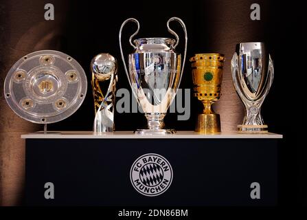 City Of Munich, Deutschland. 17th Dec, 2020. firo: 17.12.2020 football, Bundesliga 1, season 2020/2021, FIFA Men's Player 2020 trophy during the FIFA The BEST Awards ceremony, election as World Player of the Year 2020, trophies and trophies for the 2019/2020 season, FC Bayern-Picture shows the FC Bayern Munich trophies the club won in the 2019/2020 season placed on the stage for the live stream Credit: Pool/Marco Donato-FC Bayern/Pool via Getty Images/via firo Sportphoto | usage worldwide/dpa/Alamy Live News