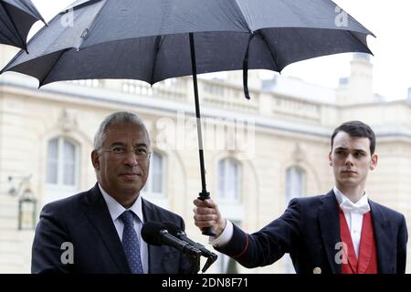 Lisbon mayor and Secretary General of the Portuguese Socialist Party, Antonio Costa answers the media whilst leaving the Elysee Palace after his meeting with French President Francois Hollande, in Paris, France on March 26, 2015. Costa's visit is part of the Summit of European Mayors for Climate hosted by Paris mayor Anne Hidalgo ahead of the United Nations Climate Change Conference, COP21, to be held at Le Bourget site near Paris from 30 November to 11 December 2015. Photo by Stephane Lemouton/ABACAPRESS.COM Stock Photo