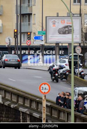 Police forces gather nearby Porte de Vincennes, east of Paris, after at least one person was injured when a gunman opened fire at a kosher grocery store on January 9, 2015 and took at least five people hostage. The attacker was suspected of being the same gunman who killed a policewoman in a shooting in Montrouge in southern Paris, France on January 8. Photo by Nicolas Briquet/ABACAPRESS.COM Stock Photo