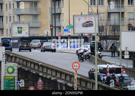 Police forces gather nearby Porte de Vincennes, east of Paris, after at least one person was injured when a gunman opened fire at a kosher grocery store on January 9, 2015 and took at least five people hostage. The attacker was suspected of being the same gunman who killed a policewoman in a shooting in Montrouge in southern Paris, France on January 8. Photo by Nicolas Briquet/ABACAPRESS.COM Stock Photo