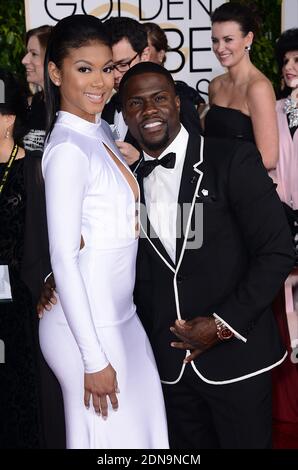 Kevin Hart and Eniko Parrish arriving at the 72nd annual Golden Globe Awards held at the Beverly Hilton in Beverly Hills, Los Angeles, CA, USA, January 11, 2015. Photo By Lionel Hahn/ABACAPRESS.COM Stock Photo