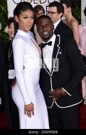 Kevin Hart and Eniko Parrish arriving at the 72nd annual Golden Globe Awards held at the Beverly Hilton in Beverly Hills, Los Angeles, CA, USA, January 11, 2015. Photo By Lionel Hahn/ABACAPRESS.COM Stock Photo