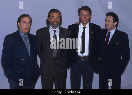 Datei-Foto aus den 80er Jahren von Michel Serrault, Jean-Paul Belmondo, Johnny Hallyday und Michel Drucker. Foto von Pascal Baril/ABACAPRESS.COM Stockfoto