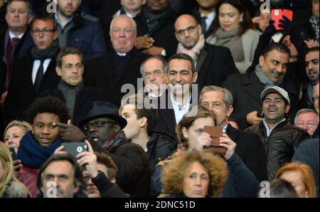 Nicolas Sarkozy, Youri Djorkaeff, Jamel Debbouze, Claire Chazal, Francois Poivre d'Arvor, Lilian Thuram and Pierre Sarkozy attending the UEFA champions League fourth round soccer match, Paris Saint-Germain Vs Chelsea FC at Parc des Princes stadium in Paris, France on February 17, 2015. Photo by Christian Liewig/ABACAPRESS.COM Stock Photo