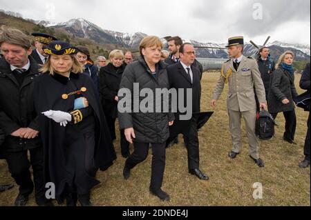 (L-R) Alpes de Haute-Provence prefect Patricia Willaert, German Chancellor Angela Merkel and French President Francois Hollande arrive in Seyne-les-Alpes, France on March 25, 2015. Merkel, Hollande, Kraft and Rajoy will be inspecting the accident site where a Germanwings A320 crashed on 24 March 2015. Photo by Lilian Auffret/Pool/ABACAPRESS.COM Stock Photo