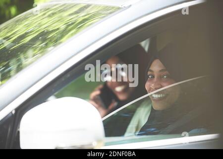 Arabic Woman Couple Traveling By Car Stock Photo