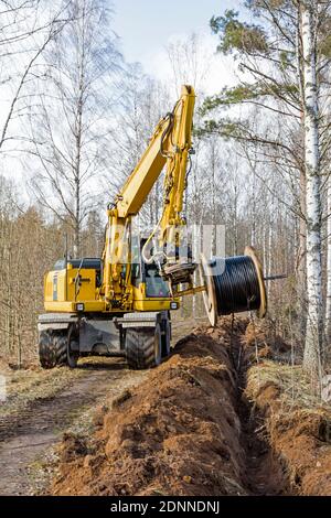 Digger bei der Arbeit Stockfoto