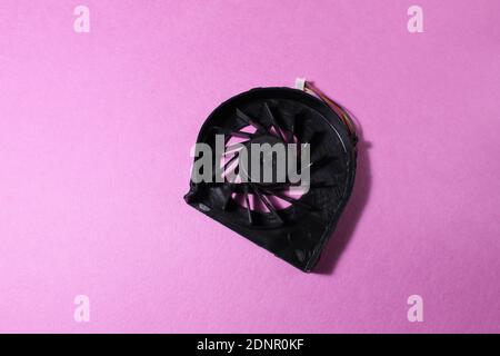 Computer cooler laptop on pink or blue background reont there is a copy of the space. Stock Photo