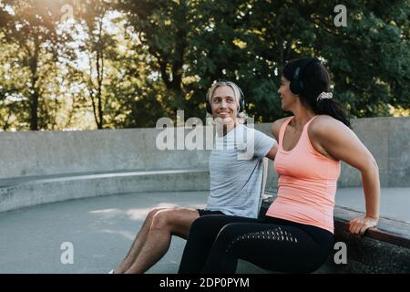 Couple doing push-ups together Stock Photo