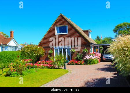 Traditionelle altmodische gemütliche Wohnhäuser in Winchelsea Beach Dorf, Rother Bezirk von East Sussex, England. August 2016 Stockfoto