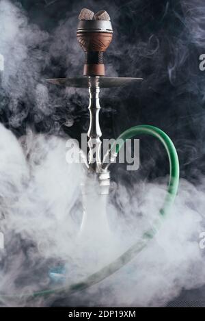 hookah on a black background with smoke Stock Photo