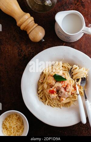 pasta in cream sauce with salmon Stock Photo