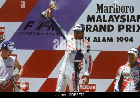 Podium Malaysia GP , Shah Alam 1994, Doohan, Kocinski, Itoh Stockfoto