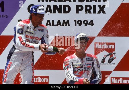 Podium Malaysia GP , Shah Alam 1994, Doohan, Kocinski, Itoh Stockfoto