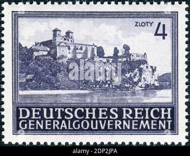 DEUTSCHLAND - UM 1943: Briefmarke gedruckt in Deutschland (Generalgouvernement, Polen), zeigt die Benediktinerabtei von Tyniec, um 1943 Stockfoto