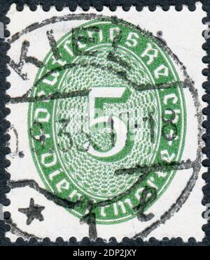 GERMANY - CIRCA 1927: Postage stamp (official stamp) printed in Germany, shown a value in an oval, circa 1927 Stock Photo