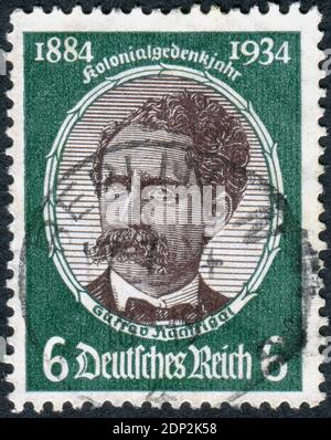 DEUTSCHLAND - UM 1934: Briefmarke gedruckt in Deutschland, zeigt das Porträt von Dr. Gustav Nachtigal, um 1934 Stockfoto