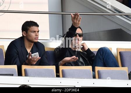 PSG players Thiago Silva and Zlatan Ibrahimovic support their team playing against Lille during French First League soccer match, at Parc des Princes stadium in Paris, France on April 25, 2015. Photo by Laurent Zabulon/ABACAPRESS.COM Stock Photo