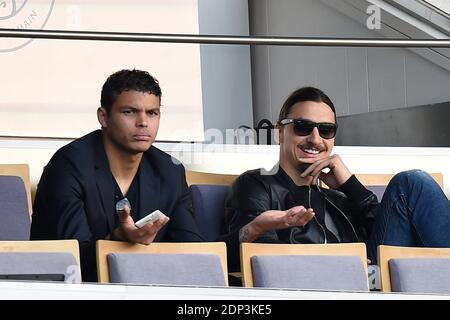 PSG players Thiago Silva and Zlatan Ibrahimovic support their team playing against Lille during French First League soccer match, at Parc des Princes stadium in Paris, France on April 25, 2015. Photo by Laurent Zabulon/ABACAPRESS.COM Stock Photo