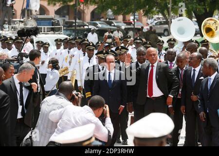 Haitian President Michel Joseph Martelly receives French President Francois Hollande at the National Palace in Port-au-Prince, Haiti on May 12, 2015. Hollande is on a five-day tour to the Caribbean including Guadeloupe, Martinique, Cuba and Haiti. Photo by Jacques Witt/Pool/ABACAPRESS.COM Stock Photo