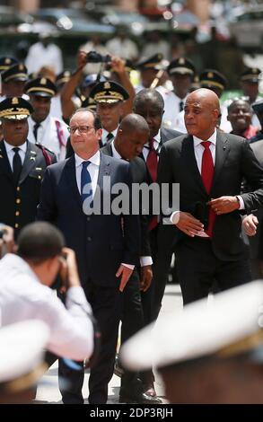 Haitian President Michel Joseph Martelly receives French President Francois Hollande at the National Palace in Port-au-Prince, Haiti on May 12, 2015. Hollande is on a five-day tour to the Caribbean including Guadeloupe, Martinique, Cuba and Haiti. Photo by Jacques Witt/Pool/ABACAPRESS.COM Stock Photo