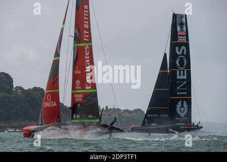 Emirates Team New Zealand maintains their lead over INEOS Team UK in race six of the regatta even after falling off their foils. PRADA America's Cup World Series Auckland Race Day Two. 18/12/2020 Stock Photo