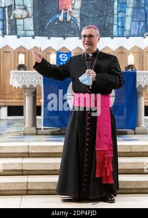 Hamburg, Germany. 13th Dec, 2020. Stefan Heße, Roman Catholic clergyman and Archbishop of Hamburg, speaks at the sending out ceremony of the Christmas Light of Peace from Bethlehem. Credit: Markus Scholz/dpa/Alamy Live News Stock Photo