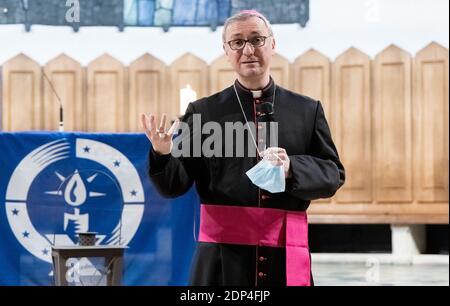 Hamburg, Germany. 13th Dec, 2020. Stefan Heße, Roman Catholic clergyman and Archbishop of Hamburg, speaks at the sending out ceremony of the Christmas Light of Peace from Bethlehem. Credit: Markus Scholz/dpa/Alamy Live News Stock Photo