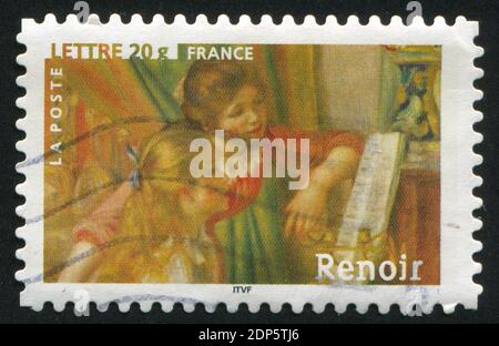 FRANKREICH - UM 2006: Briefmarke gedruckt von Frankreich, zeigt impressionistische Malerei, zwei junge Mädchen am Klavier, von Auguste Renoir, um 2006 Stockfoto