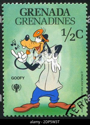 GRENADA - UM 1979: Briefmarke gedruckt von Grenada, zeigt Walt Disney Figuren, Doctor Goofy, um 1979 Stockfoto