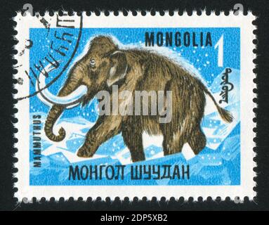 MONGOLEI - UM 1967: Briefmarke gedruckt von der Mongolei, zeigt Mammut, um 1967 Stockfoto