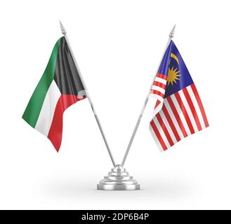 Malaysia und Kuwait Tischflaggen isoliert auf weißem 3D-Rendering Stockfoto