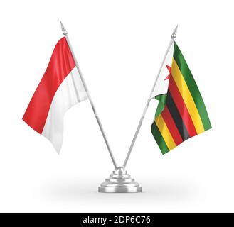 Simbabwe und Indonesien Tischflags isoliert auf weißem 3D-Rendering Stockfoto