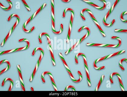 Saisonale Design für Weihnachten von Candy Canes auf EINEM Blau Hintergrund Stockfoto