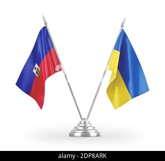 Ukraine und Haiti Tischflaggen isoliert auf weißem 3D-Rendering Stockfoto